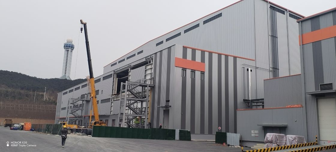 OEM फार्मास्युटिकल लॉजिस्टिक्स प्रीफैब्रिकेटेड मेटल बिल्डिंग H सेक्शन पोर्टल फ्रेम बिल्डिंग स्टील संरचना